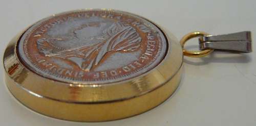 An 18 Ct Gold Plated Coin Pendant