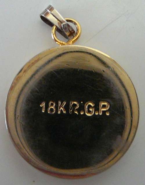 An 18 Ct Gold Plated Coin Pendant