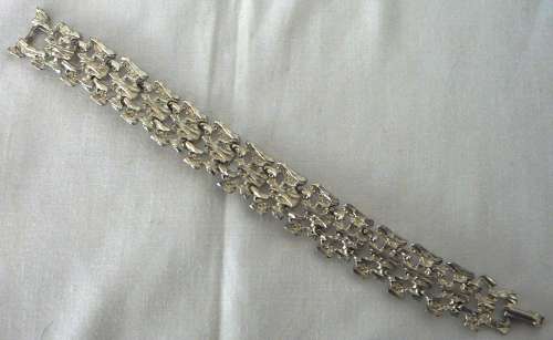 A Silver Coloured Braclet by TKB1