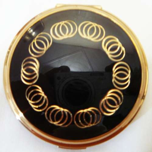 An Unused Convertible Powder Compact by Stratton