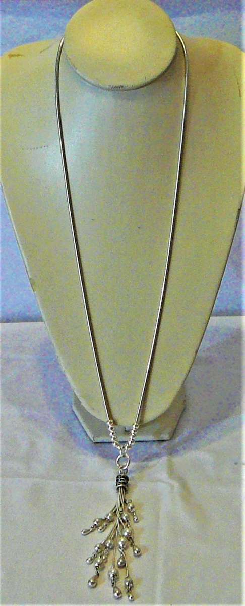 Interesting Long Pendant of Simulated Pearls and Baubles on Silver Coloured Chain