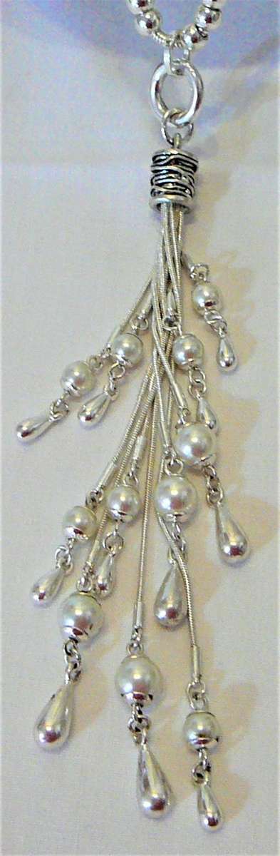 Interesting Long Pendant of Simulated Pearls and Baubles on Silver Coloured Chain