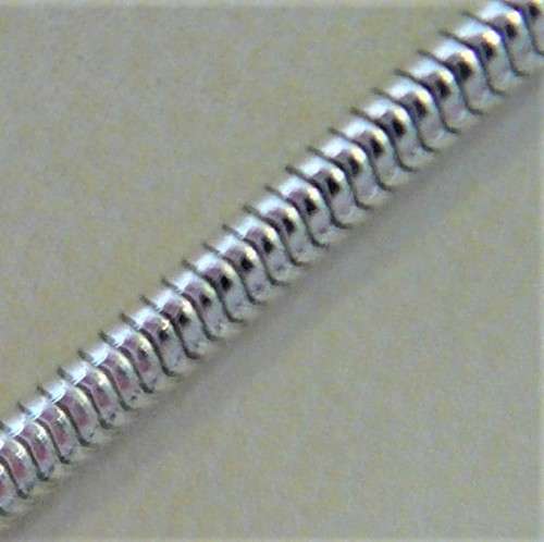 Interesting Long Pendant of Simulated Pearls and Baubles on Silver Coloured Chain