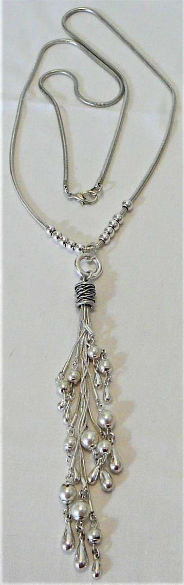 Interesting Long Pendant of Simulated Pearls and Baubles on Silver Coloured Chain