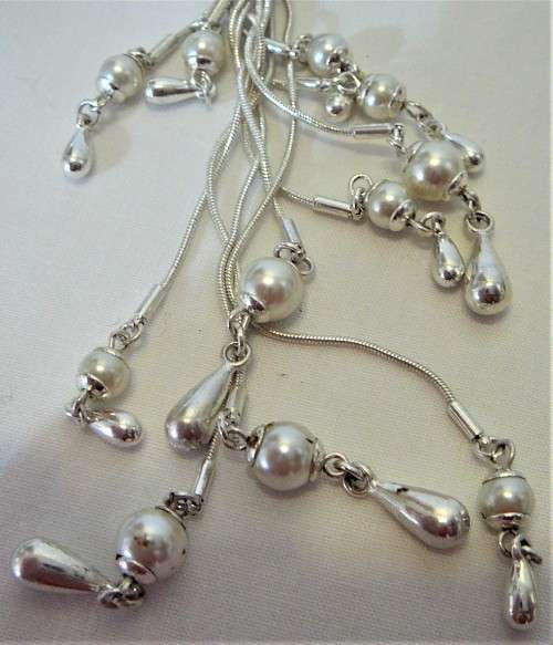 Interesting Long Pendant of Simulated Pearls and Baubles on Silver Coloured Chain