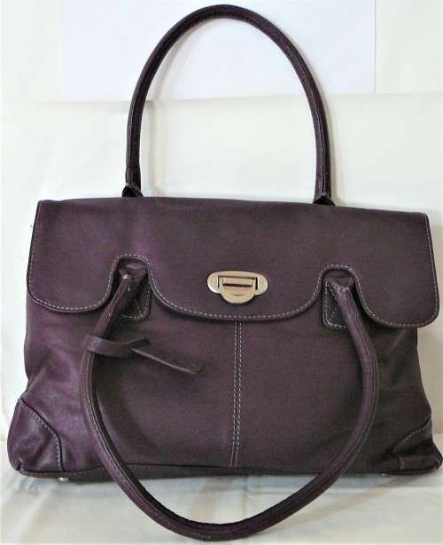 An Unused Genuine Leather Purple Handbag by Clarks