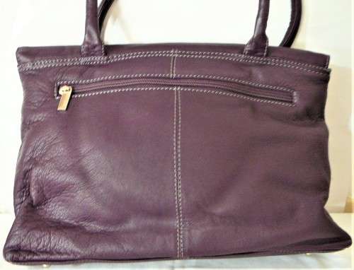 An Unused Genuine Leather Purple Handbag by Clarks