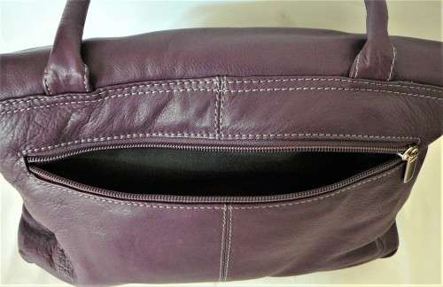 An Unused Genuine Leather Purple Handbag by Clarks