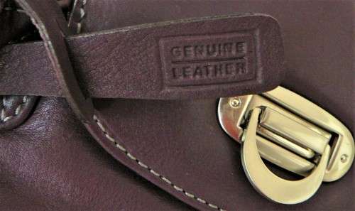 An Unused Genuine Leather Purple Handbag by Clarks