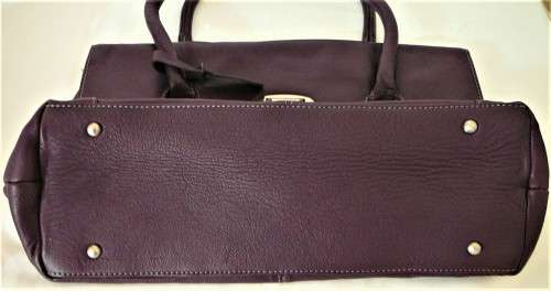 An Unused Genuine Leather Purple Handbag by Clarks