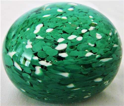 A Very Pretty Glass  Paperweight full of  Green and White Dots
