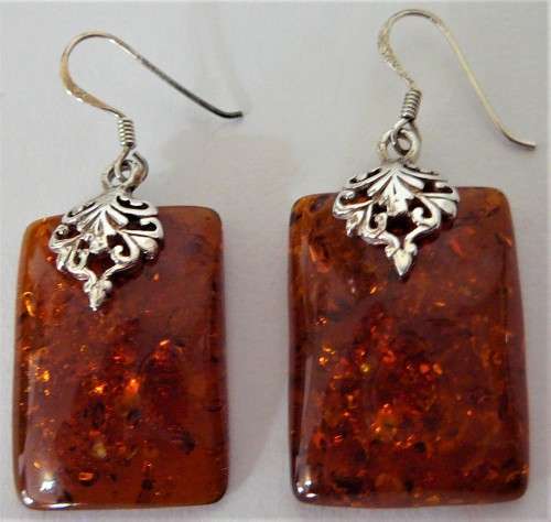 A Charmin Pair of Amber Earrings set in Sterling Silver