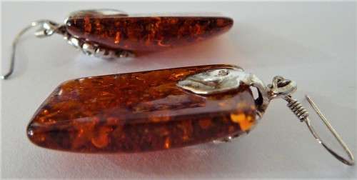 A Charmin Pair of Amber Earrings set in Sterling Silver
