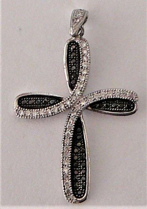 A Very attractive Sterling Silver Cross set with Black and White CZ's