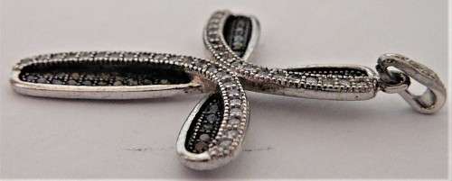 A Very attractive Sterling Silver Cross set with Black and White CZ's