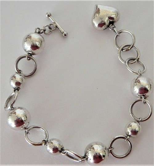 A Gorgeous Sterling Silver Ball and Heart Bracelet