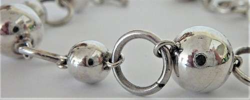 A Gorgeous Sterling Silver Ball and Heart Bracelet
