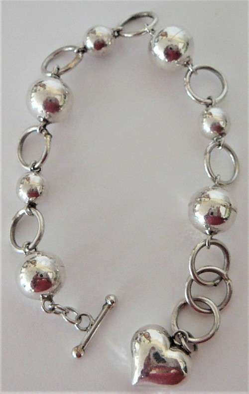 A Gorgeous Sterling Silver Ball and Heart Bracelet