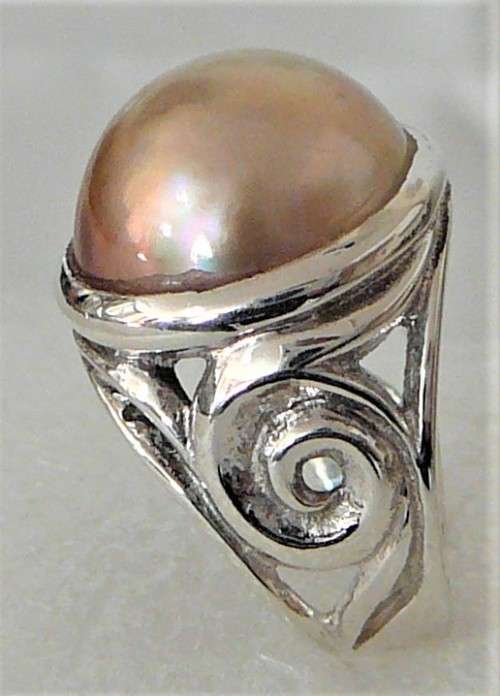 A Beautiful Sterling Silver Ring set with a Natural Pinkish Mabe Pearl