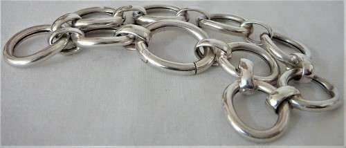 A Silver Bracelet of Hollow Silver Rings with an Unusual Hinged Ring Clasp