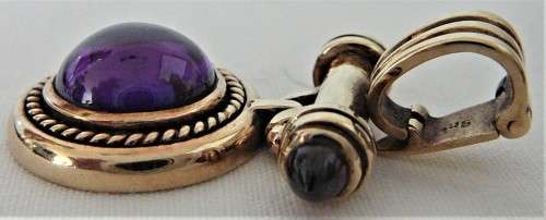 A Really Stunning Earrings and Pendant set of Amethysts and 2 Bullet Garnets set into 9ct Gold