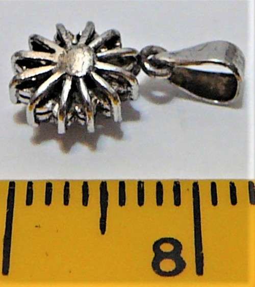 A  Very Elegant Small Sterling Silver Pendant set with an Oval Blue CZ and Tiny White CZs