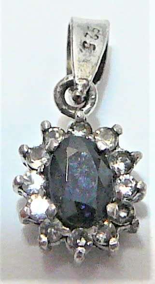 A  Very Elegant Small Sterling Silver Pendant set with an Oval Blue CZ and Tiny White CZs