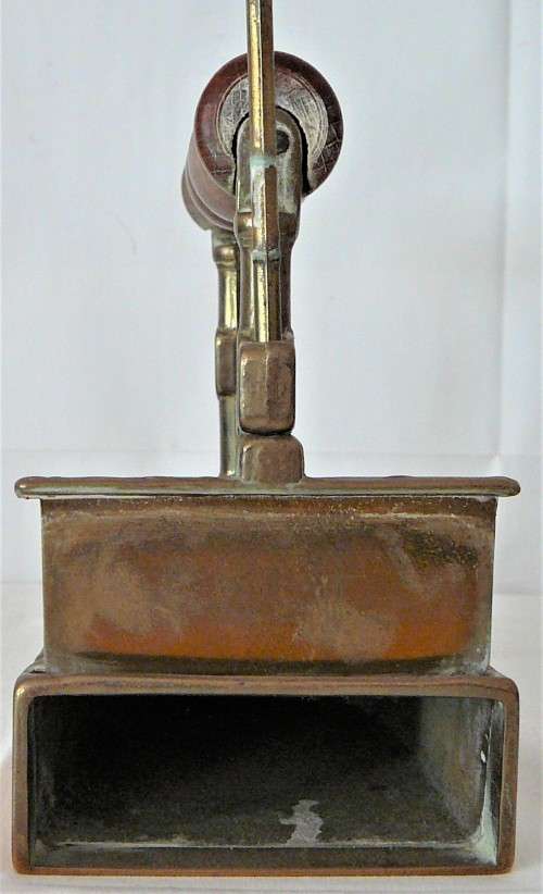 A Wooden Handled Solid Brass Smoothing Iron