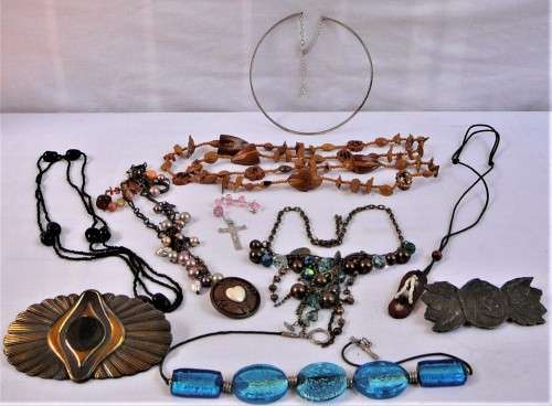 An Assortment of Costume Jewellery - Necklaces and Brass Buckles