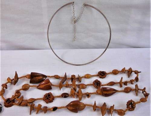 An Assortment of Costume Jewellery - Necklaces and Brass Buckles