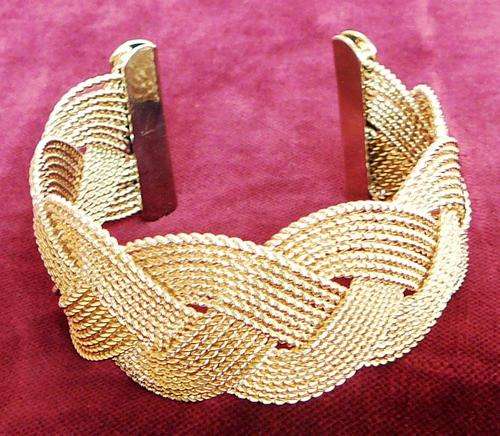 Attractive Gold Coloured Plaited Bangle