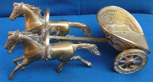 A Pair of Brass Horses Pulling a Roman Chariot