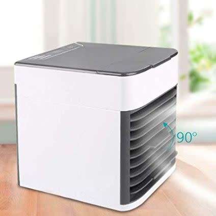 ARCTIC AIR ULTRA...MINI EVAPORATIVE COOLER...IDEAL FOR YOUR OFFICE,GARAGE,KITCHEN,IT REALLLY WORKS!