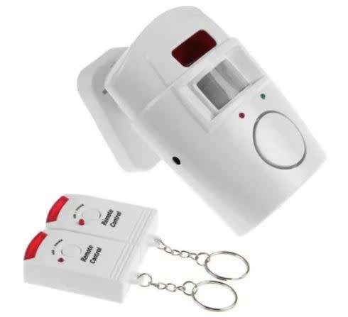 Wireless PIR Motion Sensor Alarm With 2 Remotes and Mount Bracket, Secure your Home and family NOW !