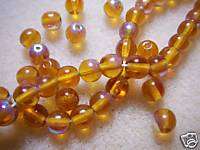 Glass bead round 4mm Topaz - Pack of 10