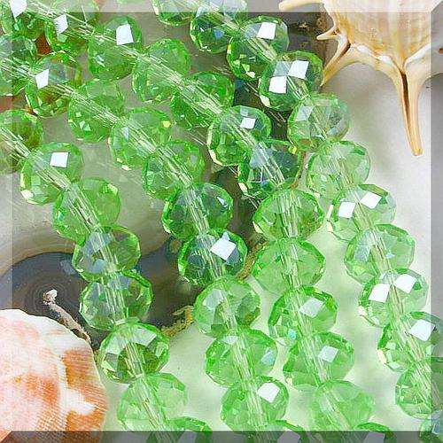 Peridot glass roundel beads with AB. 6mm. 40cm long.