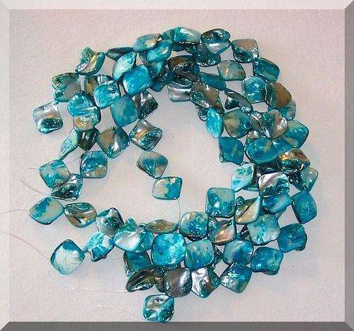 Mother of pearl irregular hoof bead AQUA string, 9-18mm . 38cm string