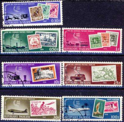 STAMP ON STAMP TOGO - SG# 320-325-  TRANSPORT - POSTAL SERVICES = COMPLETE CTO USED SET