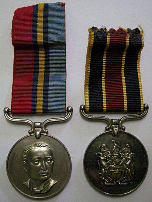 Rhodesian Police reserve and General service medals F/R Southey BR 12773H