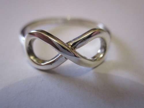 STUNNING 925. STERLING SILVER INFINITE RING- WIDTH ON TOP 8mm, SIZE P  -SEE BELOW