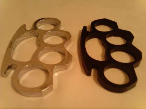 2 x KNUCKLE DUSTER'S , SILVER AND BLACK, NEW, NEVER USED -SELL AS PER SCANS.