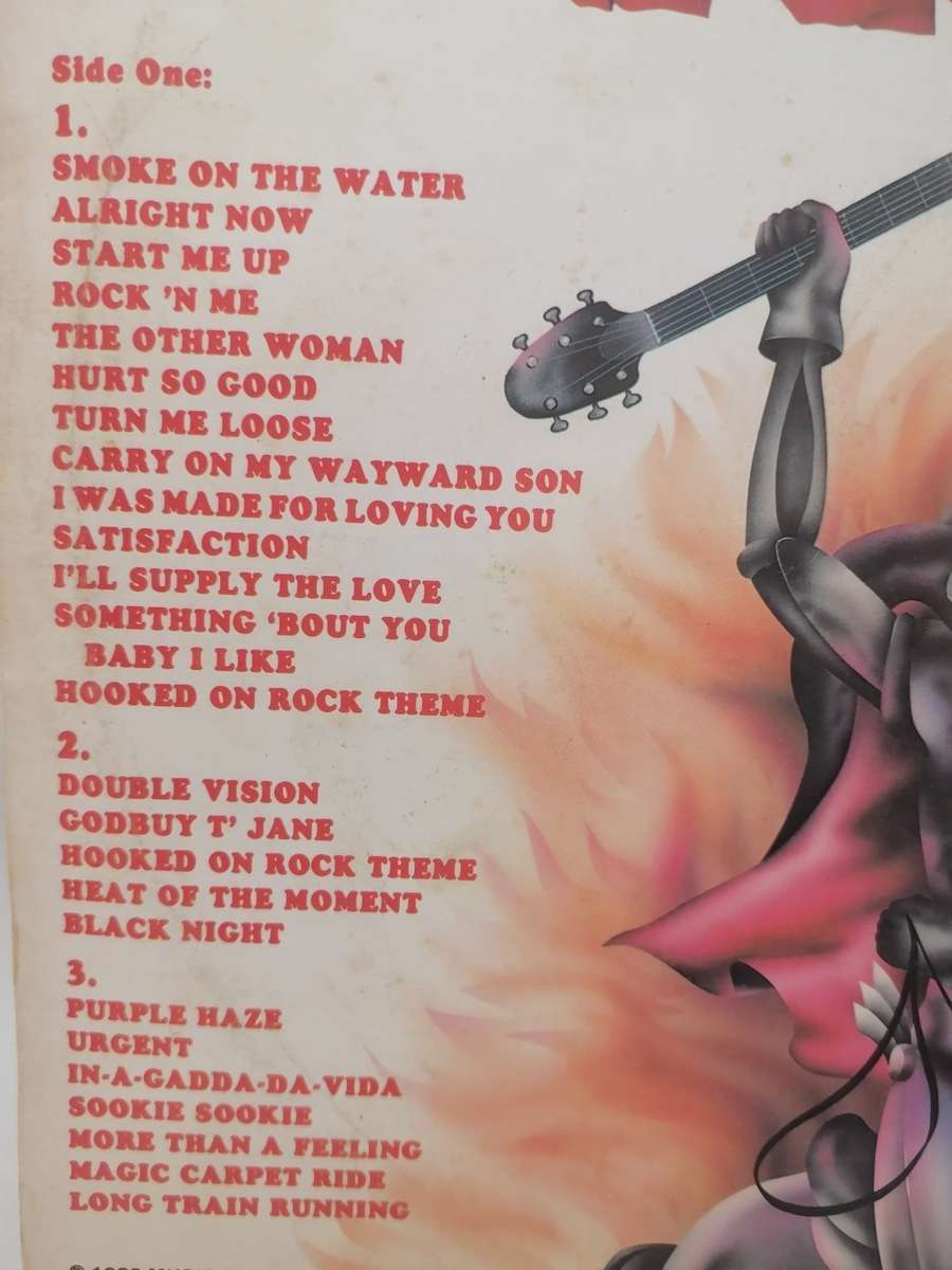 HOOKED ON ROCK (IRON FIST) - VINYL IN EXCELLENT CONDITION - SEE BELOW FOR INFO.