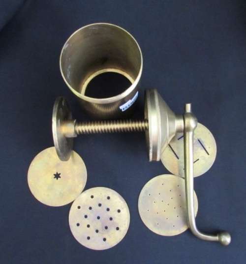 VINTAGE BRASS COOKIE PRESS WITH 4 DISKS