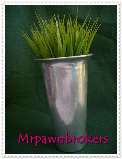 Very Unusual  Vase with plastic plant