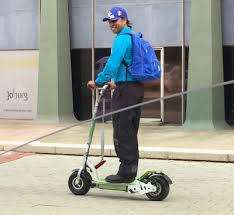 BIG UBER SCOOT S300 electric scooter, 24v 300watt motor, LARGE 9` WHEEL, DISC BRAKE,good condition,