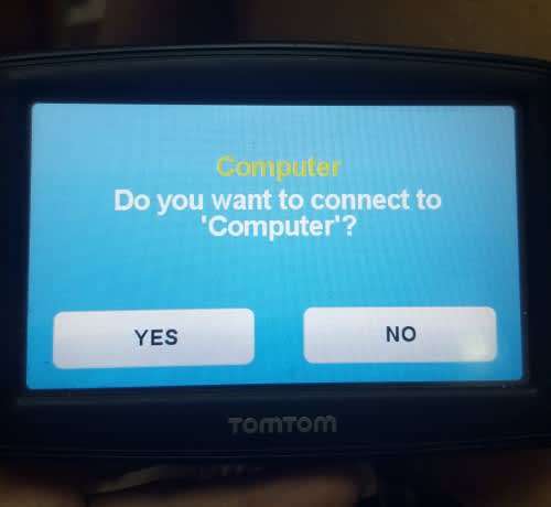 TOMTOM GPS XL WITH CHARGING CABLE, PLEASE READ