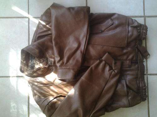 Pre  owned Wings jacket imported from Italy.Sleeves removable .Size XL