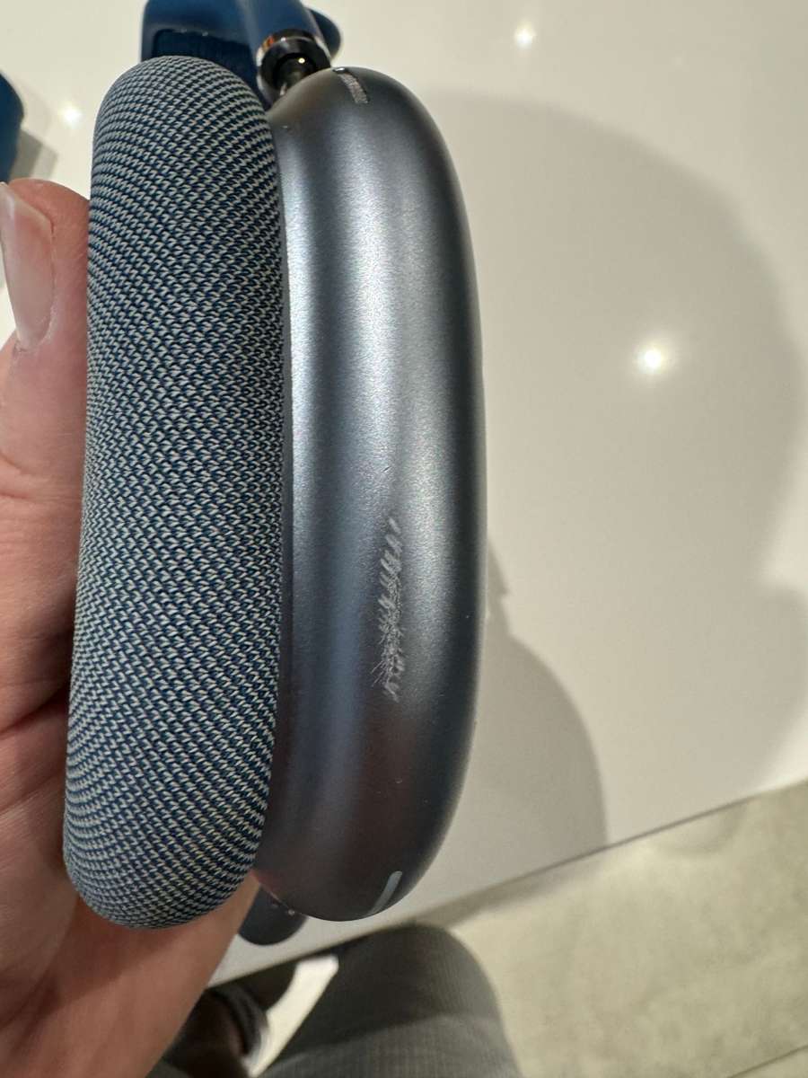 Blue AirMax Pro, with original case and charging cable