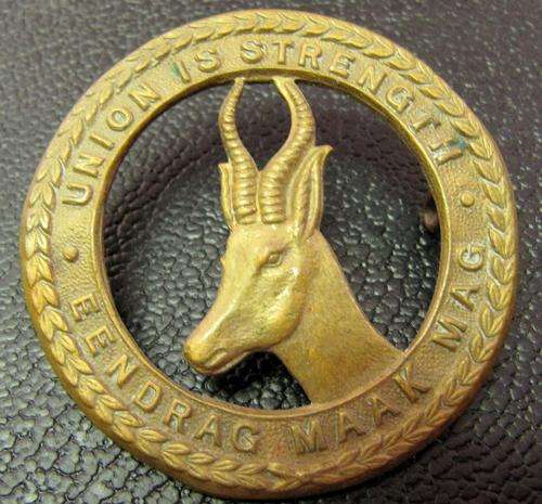 South African Defence Force cap Badge - Union is strength - Springbok facing left, 48mm