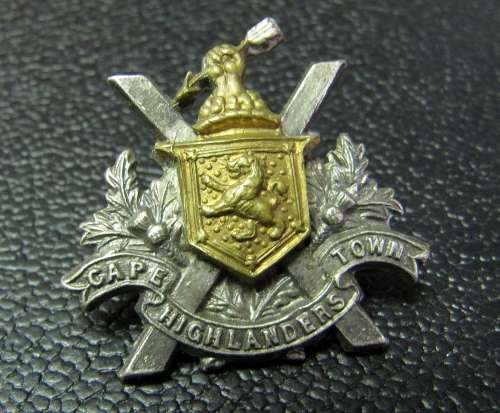 SADF Cape Town Highlanders cap badge - white metal with brass, horizontal lugs